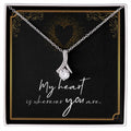 Imagine her reaction when she opens this stunning gift! The Alluring Beauty necklace features a petite ribbon shaped pendant that is sure to dazzle your special someone. Whether it's a birthday or anniversary, make sure to get her a gift she will love for years to come. 