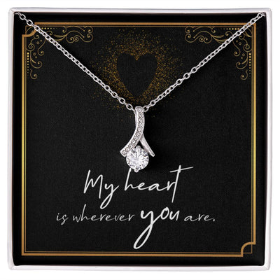 Imagine her reaction when she opens this stunning gift! The Alluring Beauty necklace features a petite ribbon shaped pendant that is sure to dazzle your special someone. Whether it's a birthday or anniversary, make sure to get her a gift she will love for years to come. 