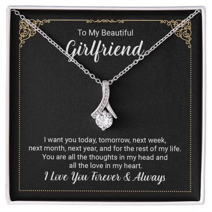 Imagine her reaction when she opens this stunning gift! The Alluring Beauty necklace features a petite ribbon shaped pendant that is sure to dazzle your special someone. Whether it's a birthday or anniversary, make sure to get her a gift she will love for years to come. 