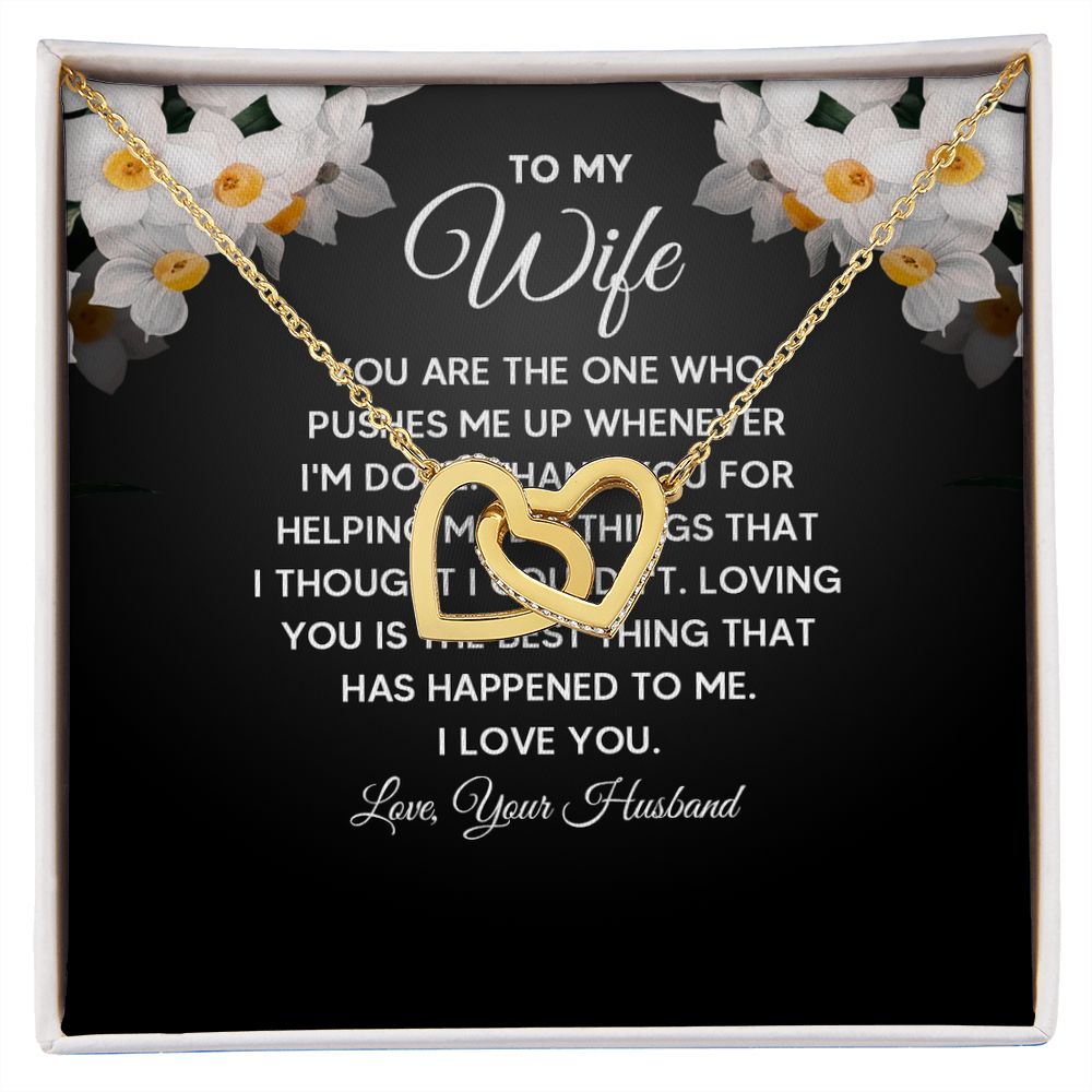 Give her the gift that symbolizes your never-ending love. Featuring two lovely hearts embellished with cubic zirconia crystals, this Interlocking Hearts necklace is the perfect accessory for everyday wear. Whether it's a memorable anniversary or a special birthday, make sure to dazzle your special someone by gifting them this stunning necklace.