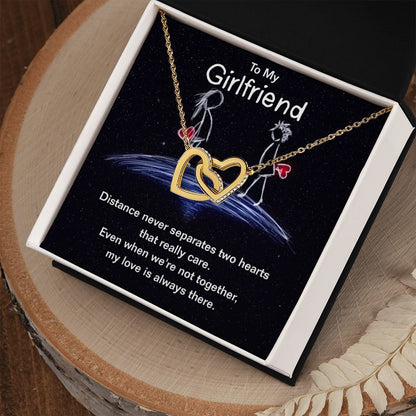 Give your girlfriend the gift that symbolizes your never-ending love. Featuring two lovely hearts embellished with cubic zirconia crystals, this Interlocking Hearts necklace is the perfect accessory for everyday wear. Whether it's a memorable anniversary or a special birthday, make sure to dazzle your special someone by gifting them this stunning necklace.