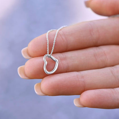 Imagine her delight when she sees this beautiful Delicate Heart Necklace, lovingly crafted in sterling silver and dipped in 14k white gold or 18k yellow gold for added luxury. This piece is pure elegance wrapped up in timeless simplicity. Trends may come and go, but this piece will last a lifetime with its classic subtle beauty.