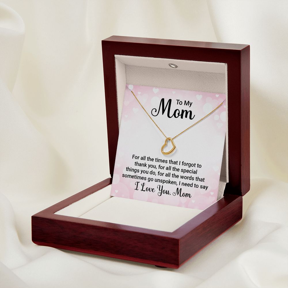 Imagine Mom's delight when she sees this beautiful Delicate Heart Necklace, lovingly crafted in sterling silver and dipped in 14k white gold or 18k yellow gold for added luxury. This piece is pure elegance wrapped up in timeless simplicity. Trends may come and go, but this piece will last a lifetime with its classic subtle beauty.