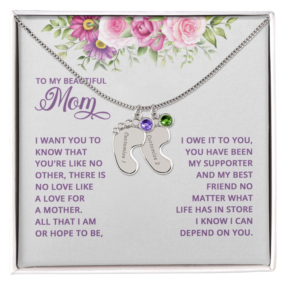 Adorn yourself with a timelessly beautiful piece of jewelry. Crafted with a subtle delicateness, the Baby Feet Necklace with Birthstone is a gorgeous combination of elegance and sentimentality. Symbolizing the unbreakable bond between mother and child, this custom necklace is crafted with personalized details and a birthstone of your choosing.