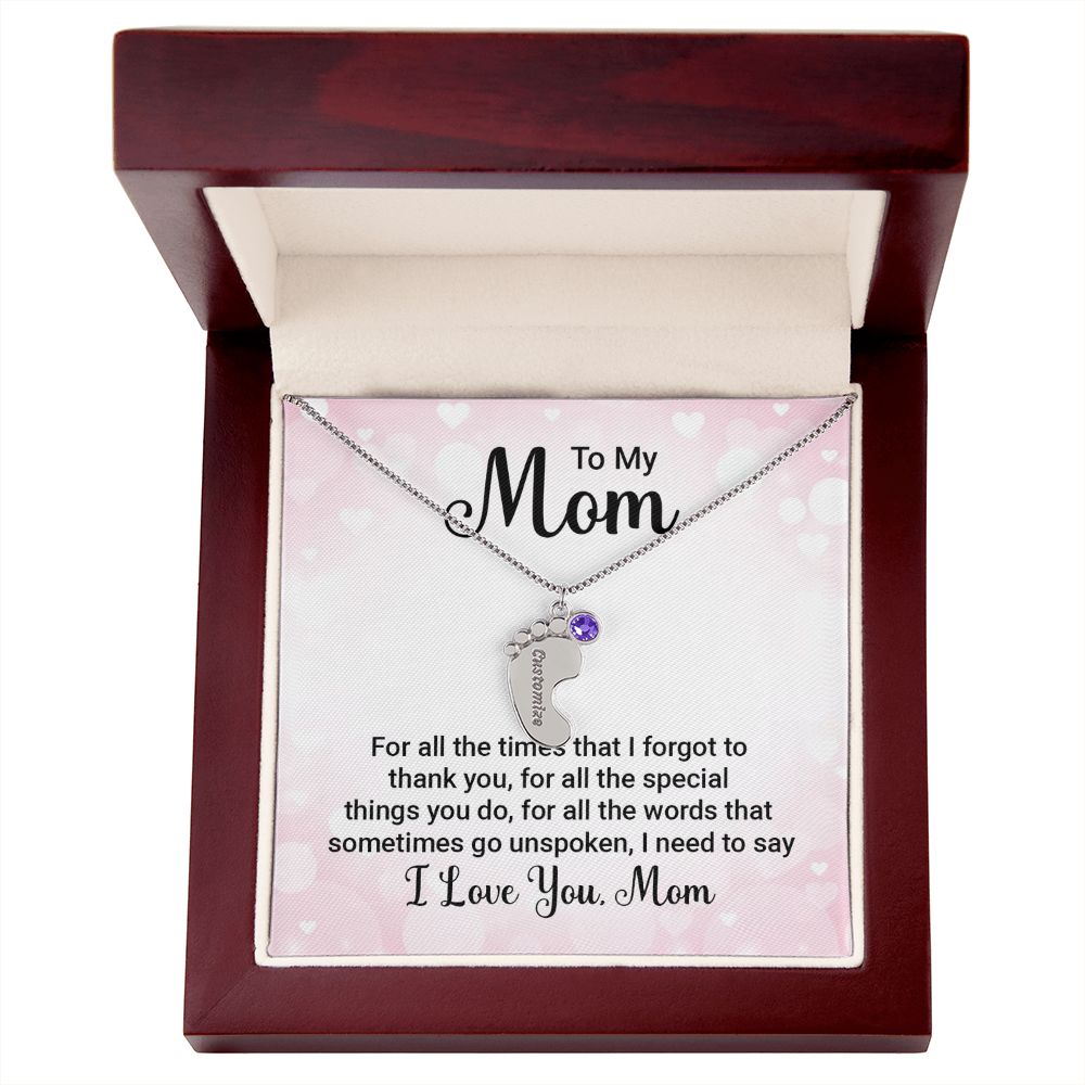 Celebrate the arrival of a newborn or cherish a precious memory with our Custom Baby Feet Necklace with Birthstone. Personalize your gift by engraving a name of your choice onto the pendant and choosing a crystal that correlates with the baby's birth month. 