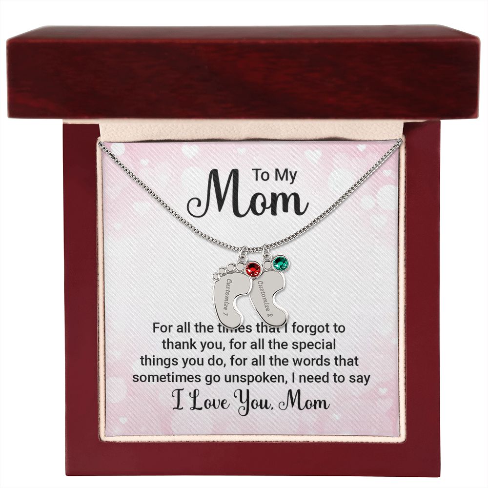 Celebrate the arrival of a newborn or cherish a precious memory with our Custom Baby Feet Necklace with Birthstone. Personalize your gift by engraving a name of your choice onto the pendant and choosing a crystal that correlates with the baby's birth month. 