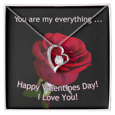 The dazzling Forever Love Necklace is sure to make her heart melt! This necklace features a stunning 6.5mm CZ crystal surrounded by a polished heart pendant embellished with smaller crystals to add extra sparkle and shine. Beautifully crafted with either a white gold or yellow gold finish, be sure to give her a classic gift she can enjoy everyday.